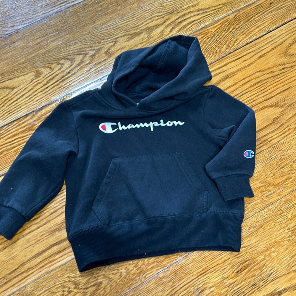 Champion black athletic hoodie sweatshirt. Logo on front. Size 24 Months.